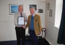 Clive Hamilton receives his certificate from Sir Hew Strachan