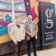 Ian Dalgleish and Mike Gray by the Mechanical Flow Mural. Photo: EGT