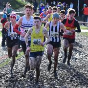 Muddy conditions and strong winds made it difficult for athletes. Photos: Neil Renton
