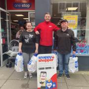Donna Whiteley (left) and John Condie (right) with Ian from Snappy Shopper