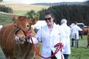 Christina Smith from Greentower Farm near Lanark  with her prize-winning Limousin. Photos: Helen Barrington