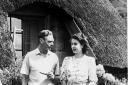 File photo dated 21/04/47 of King George VI relaxing with his daughter Princess Elizabeth during a visit to Natal National Park in South Africa. The Queen is set to enter the milestone 70th year of her reign, as she prepares to mark the anniversary of