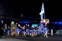 Team Scotland looking awesome in the tartan outfits woven by Lochcarron of Scotland in Selkirk,