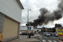 Smoke from rear of shops in Gala Water Retail Park