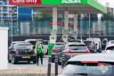 Supermarket giant Asda looks set to overcome competition concerns over its £600 million deal to buy Co-op petrol forecourts after putting forward proposals to offload 13 sites.