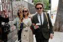 Danny Masterson, right, and his wife Bijou Phillips arrive for closing arguments in his second trial in Los Angeles (Chris Pizzello/AP/PA)