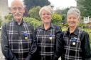 Ian Bradshaw, Emma Scott and Adrianne Robb show off their newly-acquired life membership medals from the Scottish Brass Band Association.