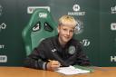 Zach Bruce signing his first professional contract. Photo Hibernian FC