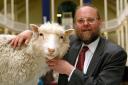 Professor Ian Wilmut with Dolly the sheep on display in the National Museum of Scotland. Photo: Maurice McDonald/PA Wire