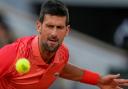 Novak Djokovic watches the ball in his win over Marton Fucsovics (Thibault Camus/AP)