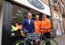 Angus Robertson with George and Angela Crow of the Hike and Bike Hub in Galashiels