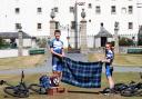 Scottish mountain bike stars Charlie Aldridge and Isla Short displaying UCI Cycling World Championships tartan