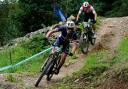 France's Hugo Pigeon (front) in action in the Men's Elite E-MTB Cross-Country race Photo PA Wire