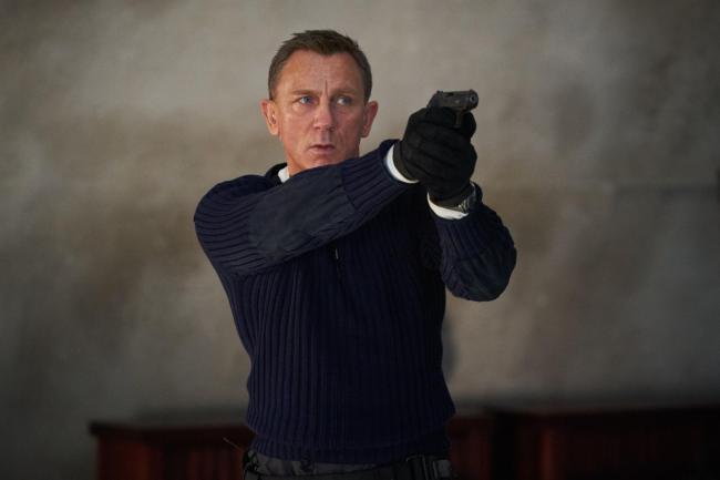 Daniel Craig playing James Bond in the new film No Time To Die. Photo: Nicola Dove/PA Wire
