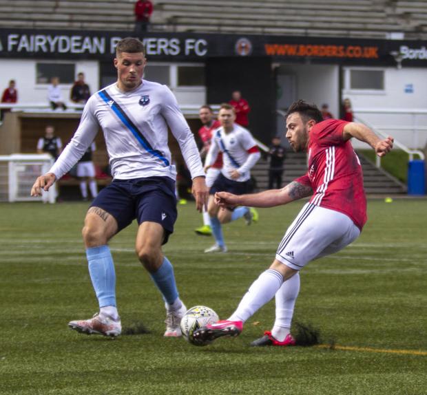 Border Telegraph: 14th August 2021 Galashiels - Zander Murray crosses the ball in during the Scottish Lowland Football League game between Gala Fairydean Rovers and Caledonian Braves at Netherdale. The home side won 5-1. *** NOT FOR SYNDICATION ***