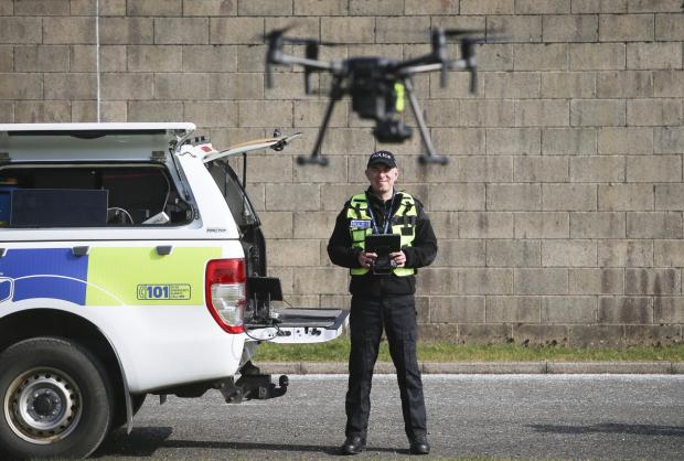 Border Telegraph: Inspector Nick Whyte of the Police Scotland Air Support Unit with drone at Jackton, East Kilbride. MISSING PERSONS feature STY..Pic Gordon Terris Herald & Times..23/3/22.