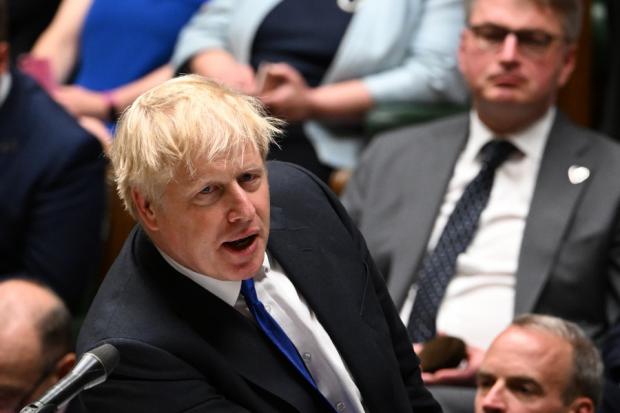 Boris Johnson 'threatens snap General Election' at excruciating MPs meeting