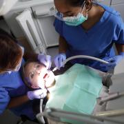 Who can get free dental care in Scotland from today?
