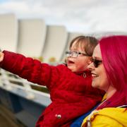 Holiday vouchers for subsidised trips will be available to families across Scotland