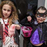 Bethan (9) and Elsie (7) from Earlston dressed as a zombie and a cat. Photo: Linda McLeish