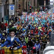 A general view of members of The People's Peloton during the opening ceremony for the 2023 UCI Cycling World Championships in George Square, Glasgow. Photo: Will Matthews/PA Wire