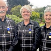 Ian Bradshaw, Emma Scott and Adrianne Robb show off their newly-acquired life membership medals from the Scottish Brass Band Association.
