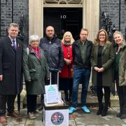 left to right - Tim Boothman - Postmaster, MP Marion Fellows, Calum Greenhow, CEO of NFSP (West Linton), Sue Edgar - Postmistress, Tim Allen - Postmaster, Jenny Cain - Postmistress and Ruth Buckley-Salmon - NFSP.