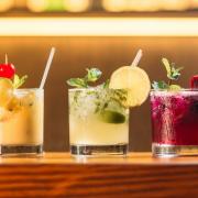 Stock image of three cocktails. Photo: Unsplash/Kobby Mendez