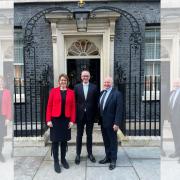 Colin and Jill McGregor with John Lamont MP at a Downing Street event