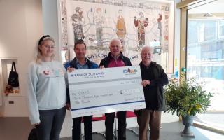 CHAS Community Fundraiser Sarah Dannfald with Galashiels Golf Club President Grant Roden (second from left) and club members Ian Crawford and Alexander Hogg (far right). Photo: CHAS